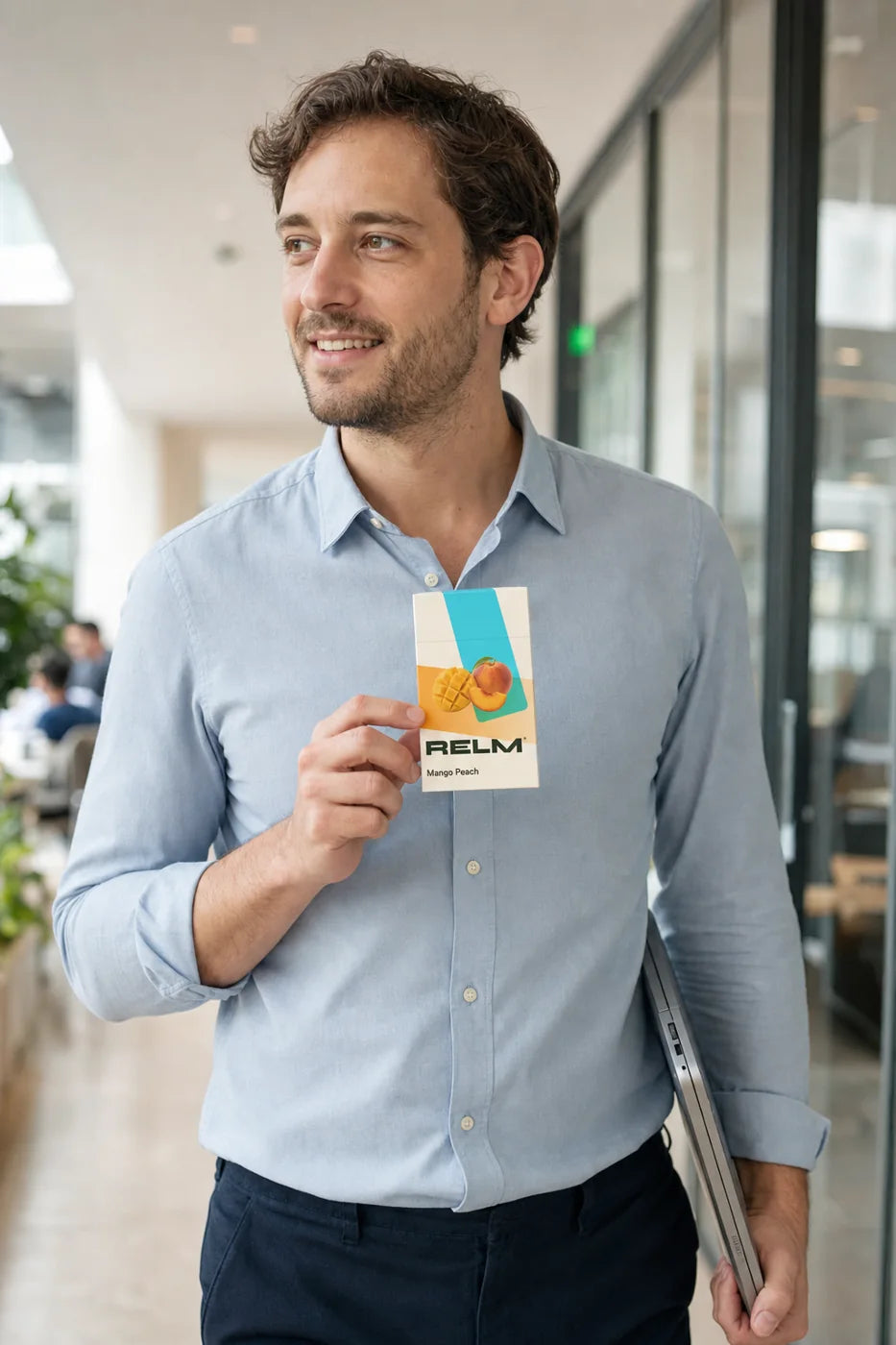 An analyst walking between meetings holding a Relm pack